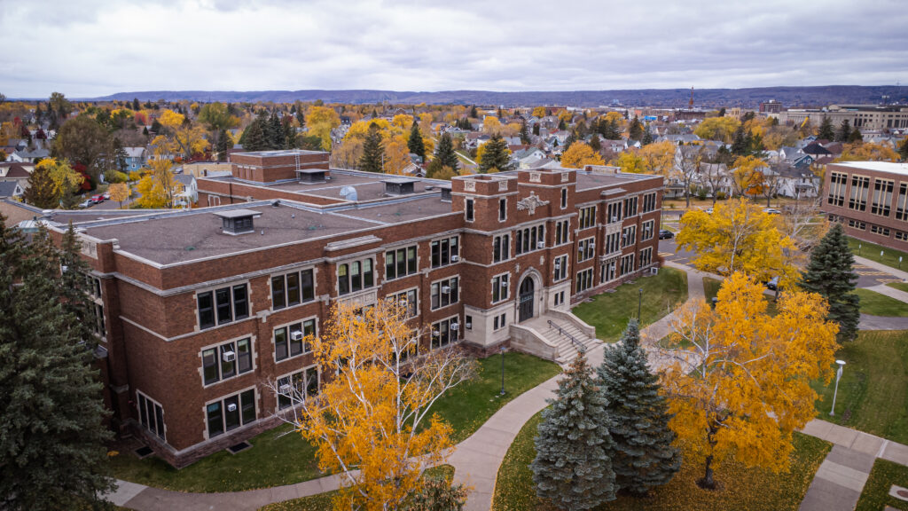 Old Main in the fall drone shot