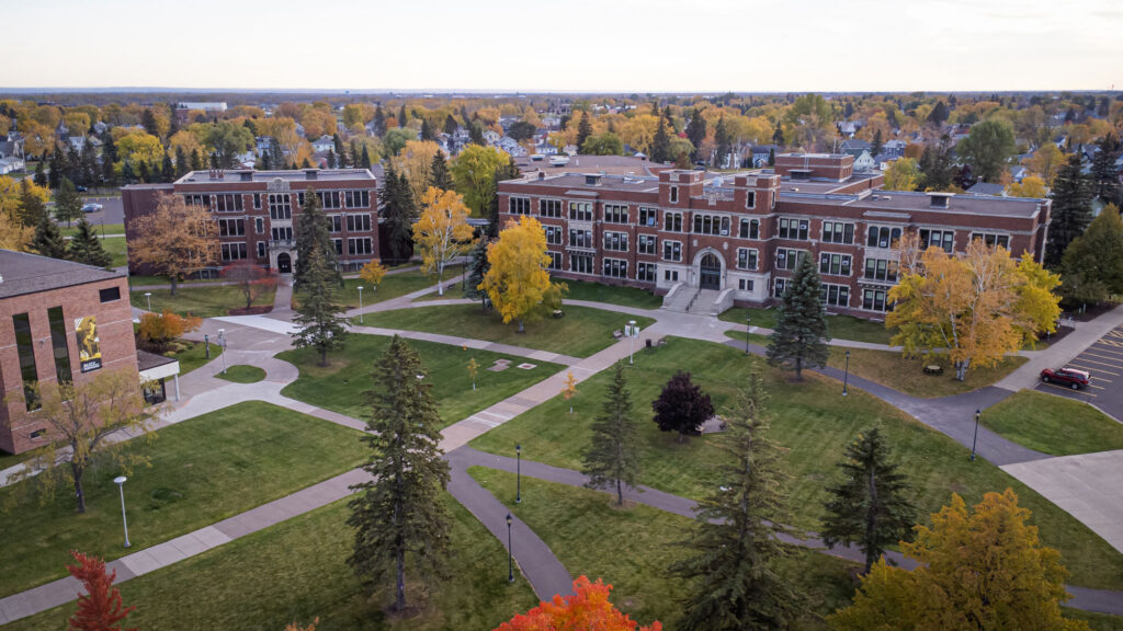 Aerial view of the UWS campus, home to a vibrant General Education Program, in autumn colors.