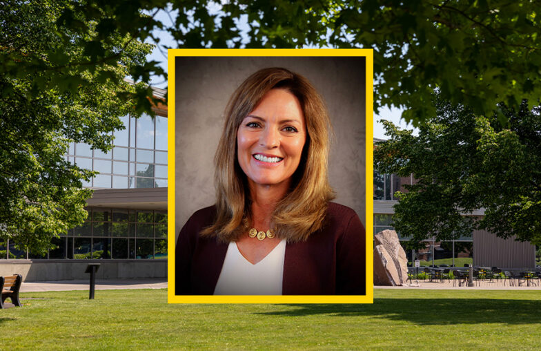 Portrait of a woman superimposed on a background of a modern building and green trees.