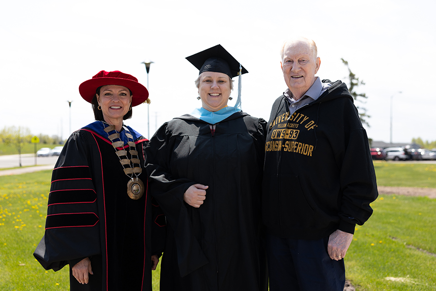 University of Wisconsin-Superior Chancellor Renée Wachter, Elizabeth Berry, 2024 UWS graduate; and her father, Terry Pierce, 1970 UWS graduate.