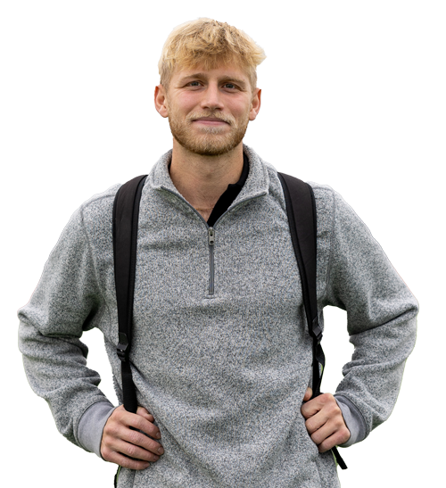 Student with a beard in a gray sweater and backpack, from the University of Wisconsin-Superior.