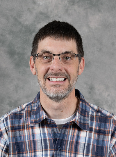 Headshot of Alan Brew.