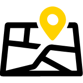 A simple illustration of a map with black lines indicating roads and a large yellow location pin marking a specific spot.